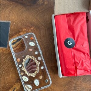 iPhone 16 Pro Max Elegant Clear Phone Case with Gold Accents and Mirror